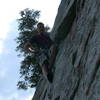 Lee just above the crux on the last pitch. There is a really nice triangle cut in the crack that lets you get your breath back before you make the moves over to the bolt.